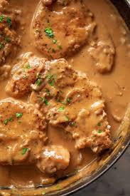 I only use salt and paper and flour to fry them on te stove usually but i want something that makes them full of flavor. Smothered Pork Chops Cafe Delites