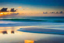 sunset the ocean waves the beach