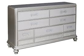 The furniture pieces are made from a variety of woods and in different shapes and sizes to match the rest of a set or have their own unique look. Coralayne 7 Drawer Dresser Ashley Furniture Homestore