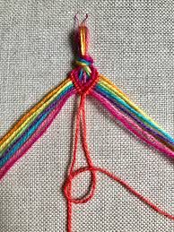 This will account for weaving and tying off the ends of the bracelet.if you're braiding thin thread, you may want to use 2 or 3 strands for each main strand of the braid. Pride Bracelets Free Rainbow Friendship Bracelets Tutorial Two Of Wands