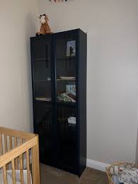 ikea navy blue bookshelf with doors for