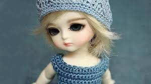 cute barbie doll in woolen knitted