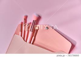 make up brushes spilling out of a beige