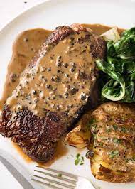 Melt 1.5 tbsp / 25g butter in a skillet over medium heat, add 1 tbsp very finely chopped eschallots/shallots (the small purple onions) and sauté gently for 1 minute. Steak With Creamy Peppercorn Sauce Recipetin Eats