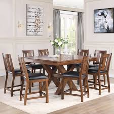 The table is really tall, but fortunately our chairs swivel up, so that's not a problem. Magnus 9 Piece Counter Height Dining Set
