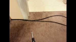 how to hide wires under the carpet