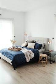 queen size bed in a small size bedroom