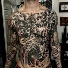 The bold lines and solid colors really represent. Chest Tattoos Best Tattoo Ideas For Men Women
