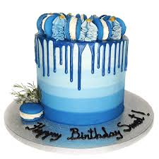 celebrate with birthday blue drip cake