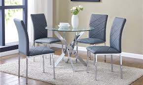 The chairs come with sturdy armrests and seat cushions for maximum comfort. Round Glass Dining Table And Chairs
