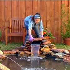 Pondless water fixture made only of natural stones. How To Build A Small Pond With A Waterfall Feature Diy Pond Waterfall Backy Ponds For Small Gardens Garden Pond Design Small Backyard Ponds