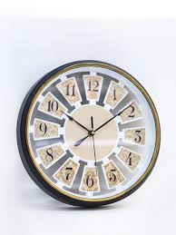 Circular Wall Clock With A Black Frame