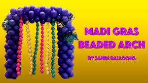 square balloon arch with beads mardi