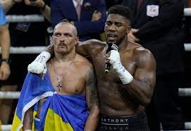Tyson Fury reacts as Oleksandr Usyk beats Anthony Joshua again