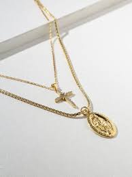 Our pawn shop partners, stock yellow gold, plated gold, white gold, aluminum, silver, titanium, platinum and stainless steel jewelry chains. The Madonna Necklace White Diamond Necklace Shop Necklaces Filigree Pendant Necklace