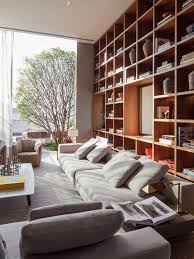 A Full Wall Bookshelf With Led Lighting