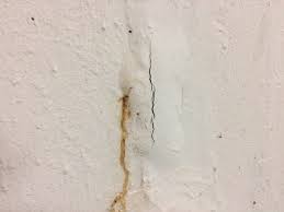 how to repair a leaky basement wall