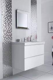 Using a level, draw a line at uniform height across the wall. 2 Bathroom Border Tiles Mirror Mosaic Tiles Lines Along The Vanity Amazing Bathroom Border Tile White Bathroom Tiles Grey Bathroom Tiles Bathroom Interior