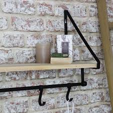 wall shelf with hanging hooks