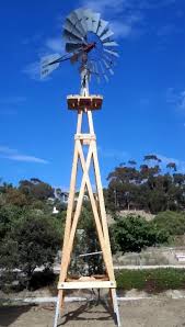 custom wood windmill towers rock