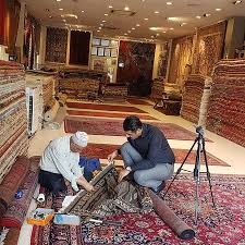 mr naseer bhatti checking carpet repair