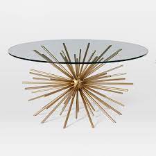 round brass starburst glass coffee table