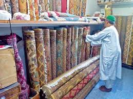 carpet weavers abandon looms