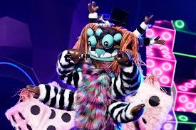 He has two hands with three sausage like claws. Masked Singer Recap Squiggly Monster Eliminated Revealed As Comedian Ew Com