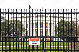 Garden Iron Fence And Security Warning