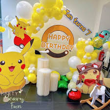 cartoon theme set up w balloon garlands