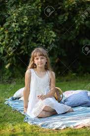 Only teens models galleries no downloads (thumbnails). Young Teen Girl Sitting And Smiling On A Blanket In Nature Stock Photo Picture And Royalty Free Image Image 74939270