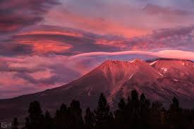 Photos of lenticular clouds over Mount Shasta by Brad Goldpaint.