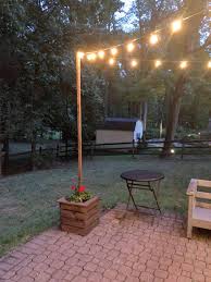 diy string light poles and planters