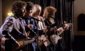 watch traveling wilburys red all
