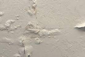 10 signs of water damage in walls or