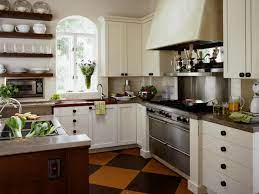 This white shaker kitchen feels open, airy, and maintains a sense of visual consistency throughout. Country Kitchen Cabinets Pictures Ideas Tips From Hgtv Hgtv