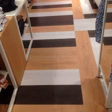 Where is commercial flooring solutions, inc.located? Vinyl Flooring Loose Lay Antiskid Floover Tertiary Tile Wood Look
