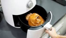 Can you put water in bottom of air fryer?