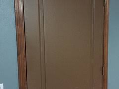 stained wood trim and painted doors