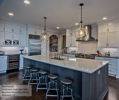 Other layouts, however, lead to a problem i see all too often…the large, square island. White Shaker Cabinets With A Large Kitchen Island Masterbrand