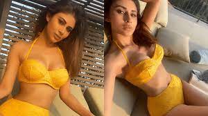 Watch Video: Sexy Mouni Roy flaunts her hourglass figure in a yellow bikini