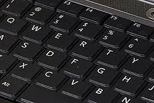 A key normally in the upper left corner of a keyboard labelled with program specific functions such as backing out of a menu. Computer Keyboard Wikipedia