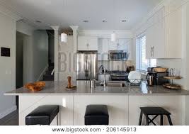 736 x 581 jpeg 60 кб. Modern White Kitchen With Stainless Steel Appliances Interior Design Stock Images Page Everypixel