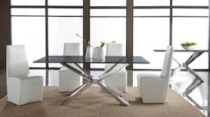 Metal corner brackets, decorative studs, and a supported pedestal base give the. Cointet 75 Inch Dining Table Crackle Glass