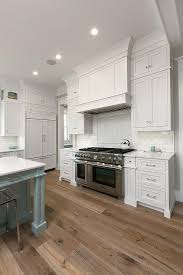 white kitchen cabinets with sawn oak