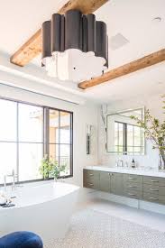 master bathroom with wood ceiling beams