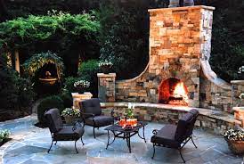 outdoor area with a fireplace