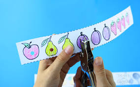 First i cut the bottoms off some egg cartons and cut them apart. Hole Punching Hungry Caterpillar Activity Free Printable