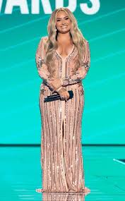 This year's edition of pop culture's annual awards show is hosted by demi lovato. Demi Lovato Pokes Fun At Engagement To Max Ehrich At The 2020 Pcas E Online
