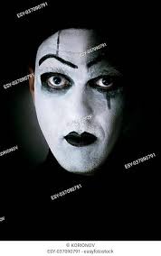 dark portrait of actor with mime makeup